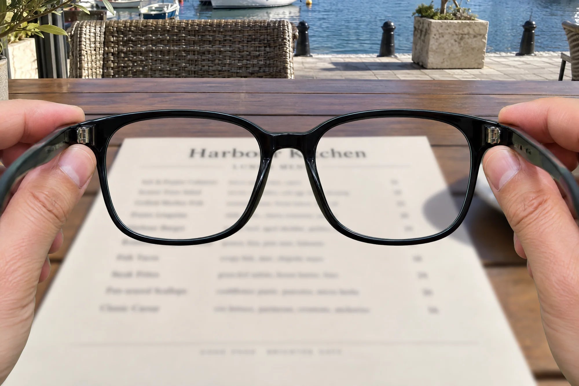 Looking through plain glasses at a lunch menu: the text is blurry.